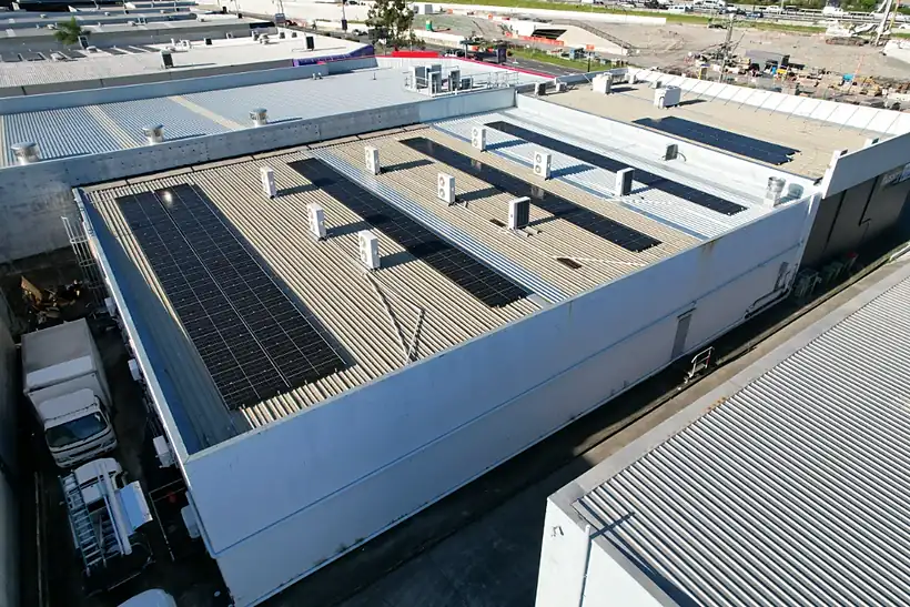 Angled aerial view of the solar arrays on the Impact Church roofs in Slacks Creek