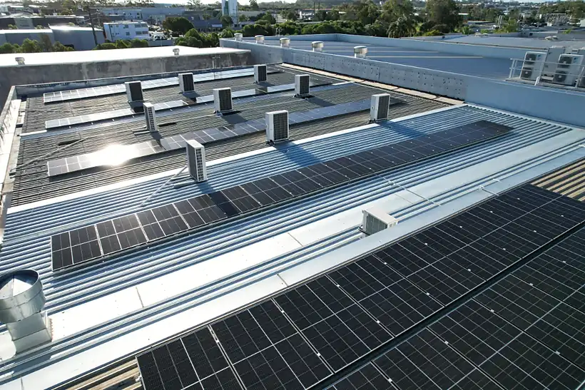 Impact Church roof arrays beside rooftop plant