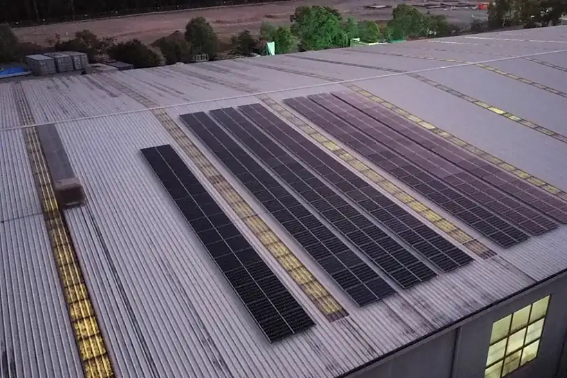 Long strips of solar panels on the LaserFab warehouse roof at Yatala